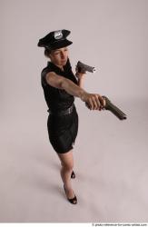 NIKITA POLICEWOMAN WITH TWO GUNS